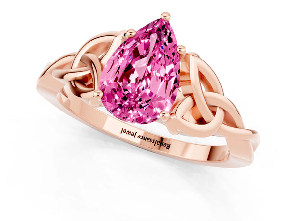 Rose gold Pear Cut Pink Sapphire Solitaire Engagement Ring with Celtic Knot Band and Four-Prong Setting