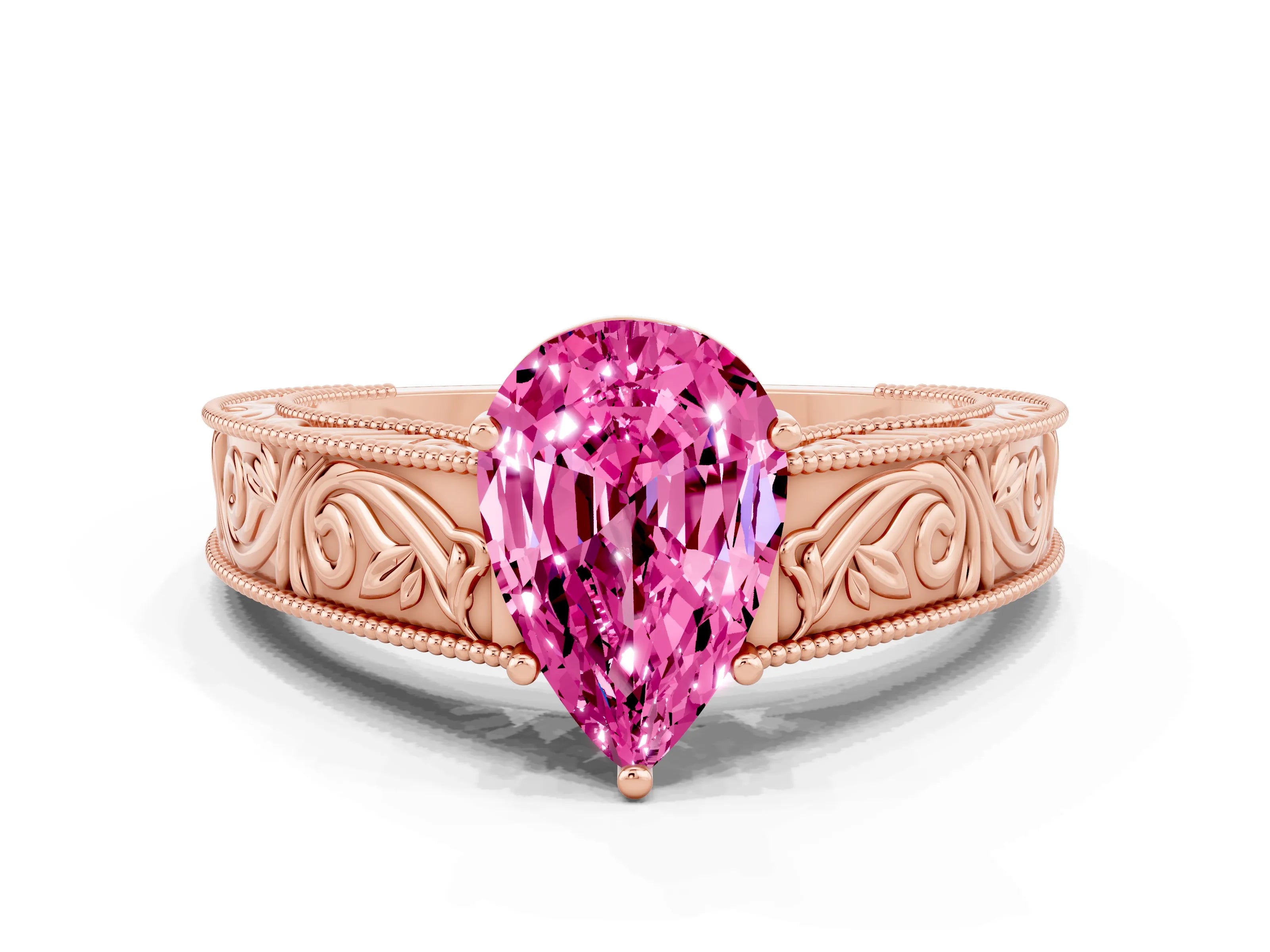 Rose gold Pear Cut Pink Sapphire Solitaire Ring with Engraved Band and Four-Prong Setting