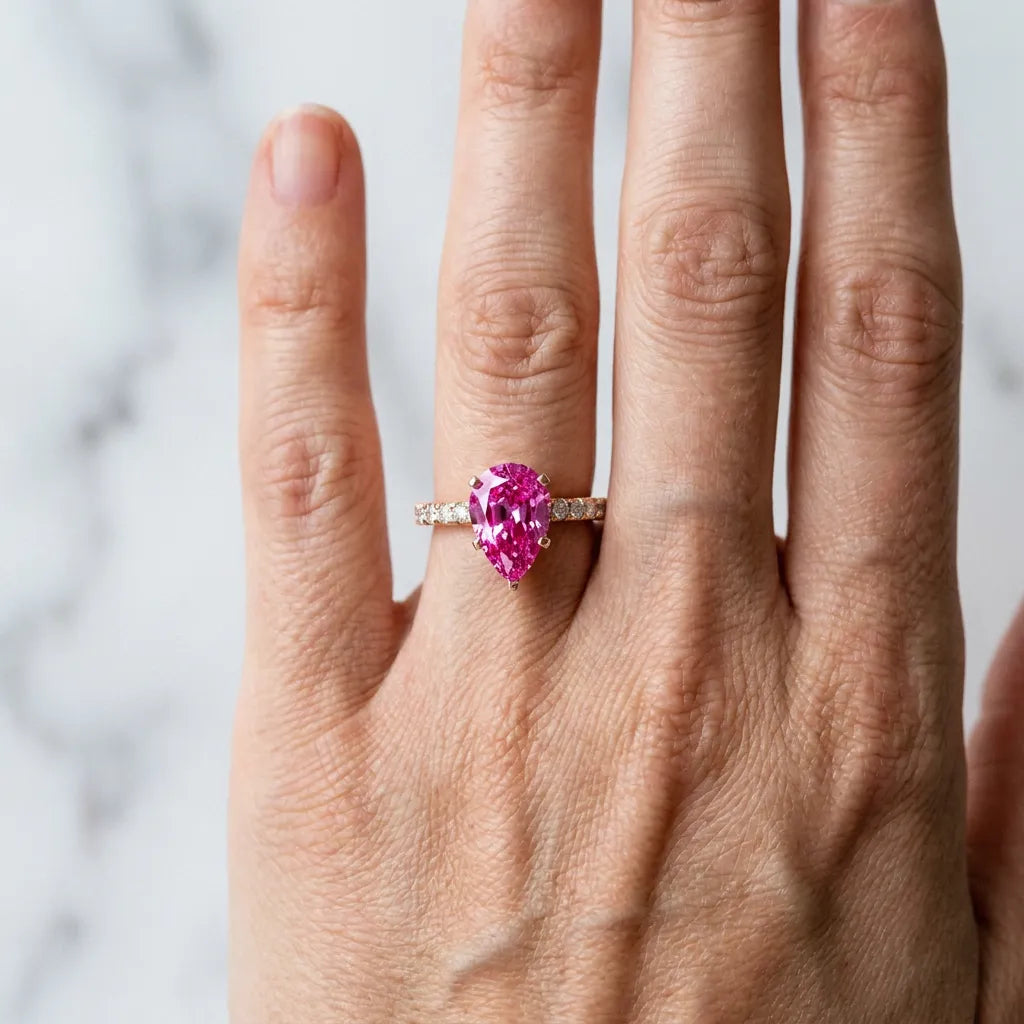 Rose gold Pear Cut Pink Sapphire Solitaire Ring with Round  Pavé Band and Four-Prong Setting_78