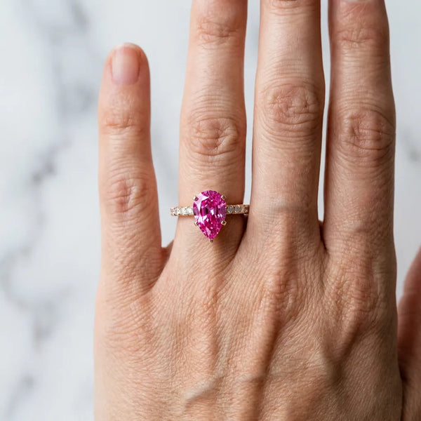 Rose gold Pear Cut Pink Sapphire Solitaire Ring with Round  Pavé Band and Four-Prong Setting