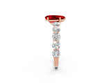 Rose gold Pear Cut Ruby Prong Setting with Side Stones on a Pave Band_2