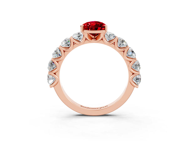 Rose gold Pear Cut Ruby Prong Setting with Side Stones on a Pave Band