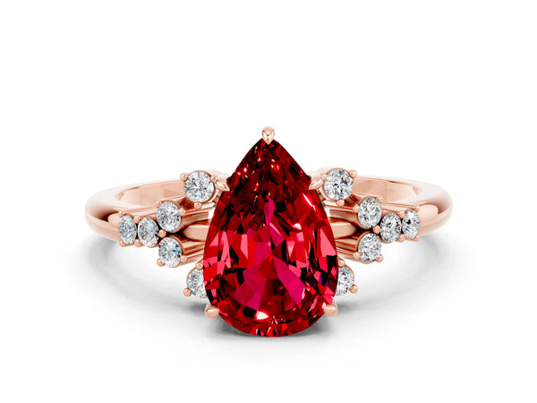 Rose gold Pear Cut Ruby Ring with Side Stones and Four-Prong Setting