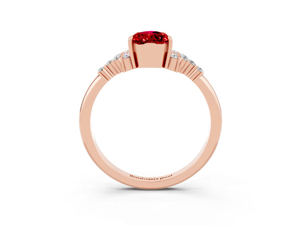 Rose gold Pear Cut Ruby Ring with Side Stones and Four-Prong Setting