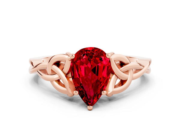 Rose gold Pear Cut Ruby Solitaire Celtic Knot Ring with Four-Prong Setting