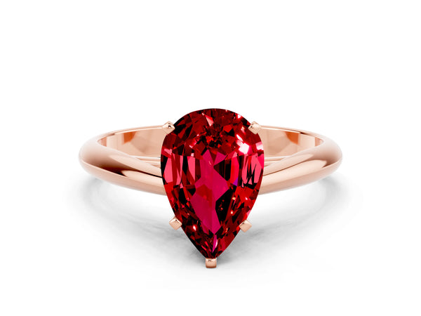 Rose gold Pear Cut Ruby Solitaire Engagement Ring with Cathedral Setting and Four-Prong Mount