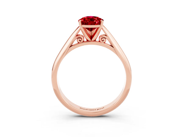Rose gold Pear Cut Ruby Solitaire Engagement Ring with Cathedral Setting and Four-Prong Mount