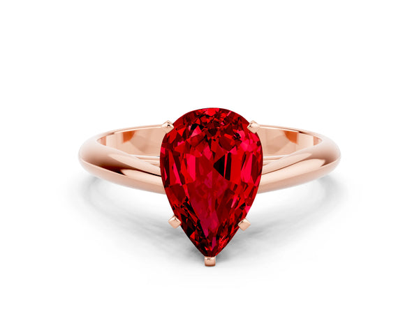 Rose gold Pear Cut Ruby Solitaire Engagement Ring with Cathedral Setting and Four-Prong Mount