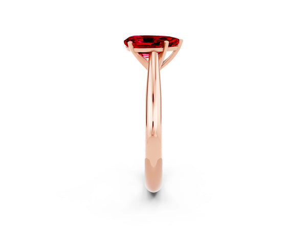 Rose gold Pear Cut Ruby Solitaire Engagement Ring with Cathedral Setting and Four-Prong Mount