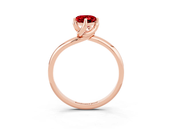 Rose gold Pear Cut Ruby Solitaire Engagement Ring with Four-Prong Setting and Classic Band