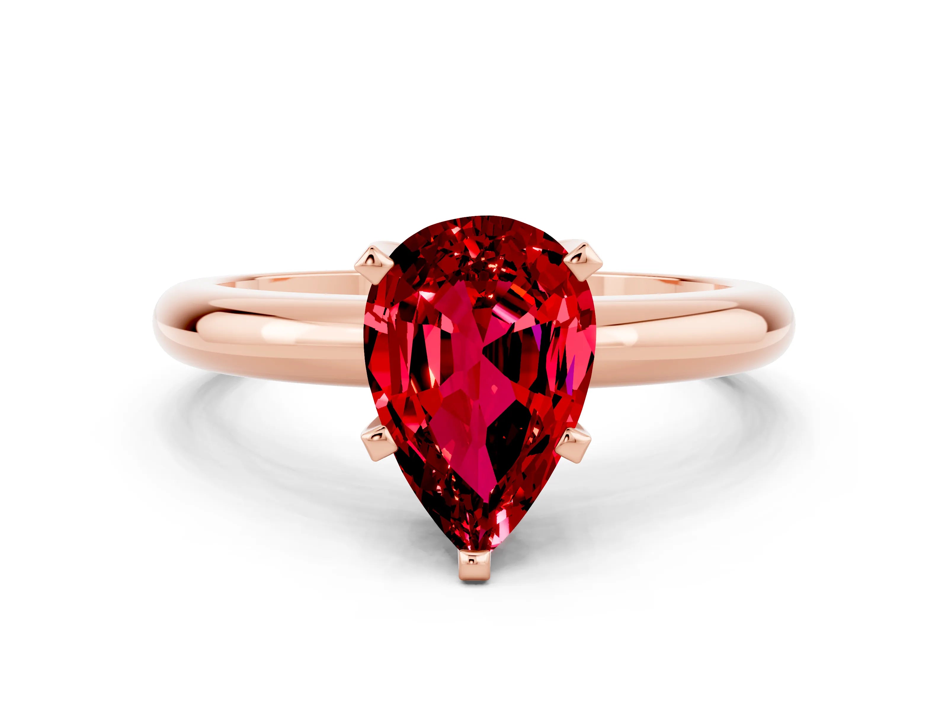 Rose gold Pear Cut Ruby Solitaire Engagement Ring with Round Band and Four-Prong Setting
