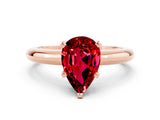 Rose gold Pear Cut Ruby Solitaire Engagement Ring with Round Band and Four-Prong Setting