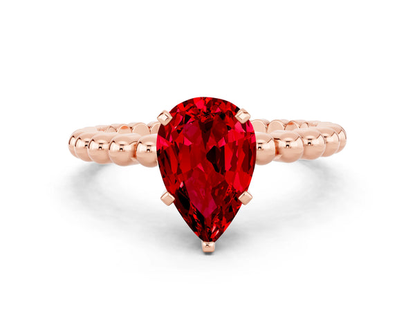 Rose gold Pear Cut Ruby Solitaire Ring with Beaded Band and Prong Setting