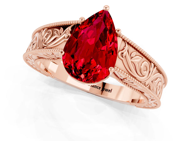 Rose gold Pear Cut Ruby Solitaire Ring with Engraved Band and Four-Prong Setting