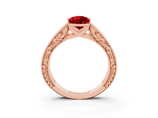 Rose gold Pear Cut Ruby Solitaire Ring with Engraved Band and Four-Prong Setting
