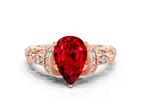 Rose gold Pear Cut Ruby Solitaire Ring with Filigree Band and Four-Prong Setting