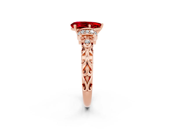 Rose gold Pear Cut Ruby Solitaire Ring with Filigree Band and Four-Prong Setting