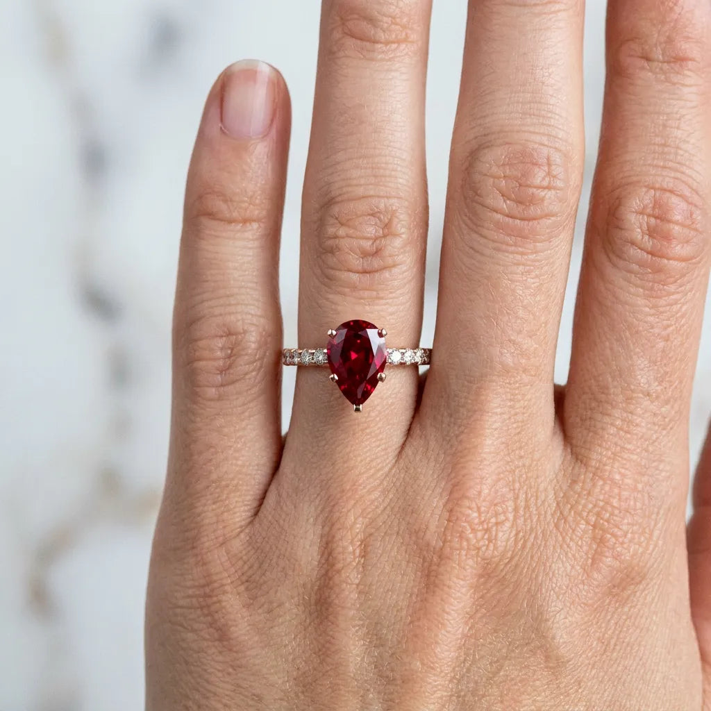 Rose gold Pear Cut Ruby Solitaire Ring with Round  Pavé Band and Four-Prong Setting_42