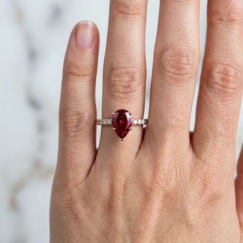 Rose gold Pear Cut Ruby Solitaire Ring with Round  Pavé Band and Four-Prong Setting_42
