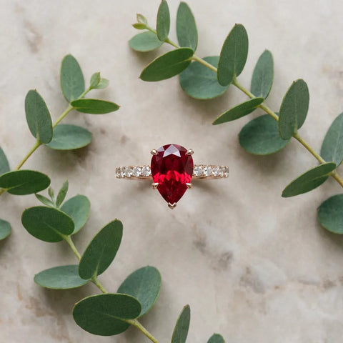 Rose gold Pear Cut Ruby Solitaire Ring with Round  Pavé Band and Four-Prong Setting_45