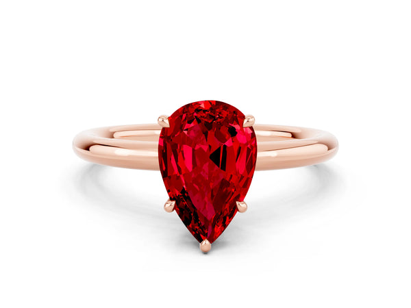 Rose gold Pear Cut Ruby Solitaire Ring with Thin Band and Four-Prong Setting