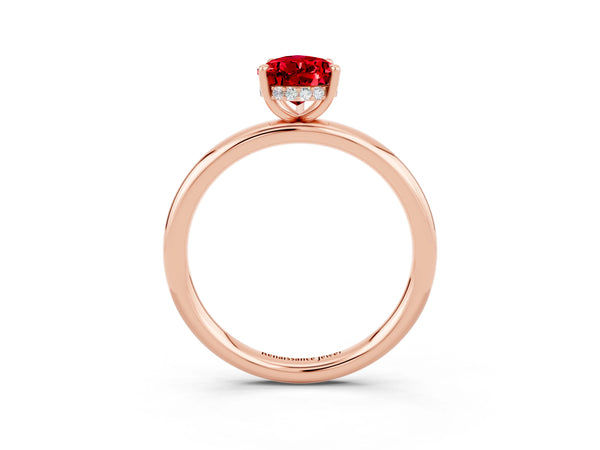 Rose gold Pear Cut Ruby Solitaire Ring with Thin Band and Four-Prong Setting