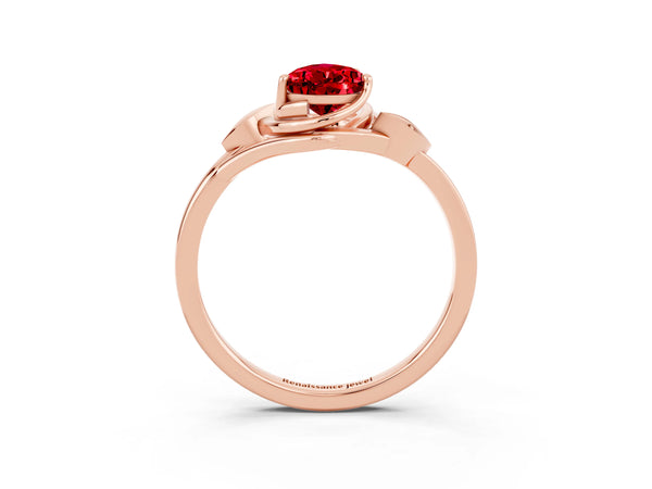 Rose gold Pear Cut Ruby Solitaire Ring with Twist Band and Four-Prong Setting