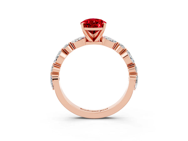 Rose gold Pear Cut Ruby Ring with Marquise and Round  Side Stones and Four-Prong Setting