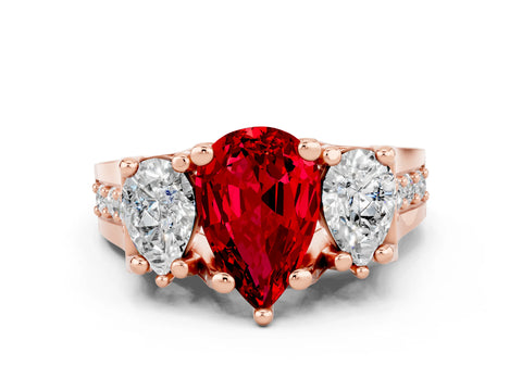 Rose gold Pear Cut Ruby Three-Stone Ring with Channel Set Band and Four-Prong Setting