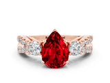 Rose gold Pear Cut Ruby Three-Stone Ring with Pavé Split Shank and Four-Prong Setting_12