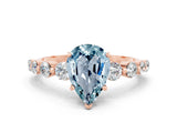 Rose gold Pear Cut Solitaire Aquamarine Ring with Pave Band and Four-Prong Setting