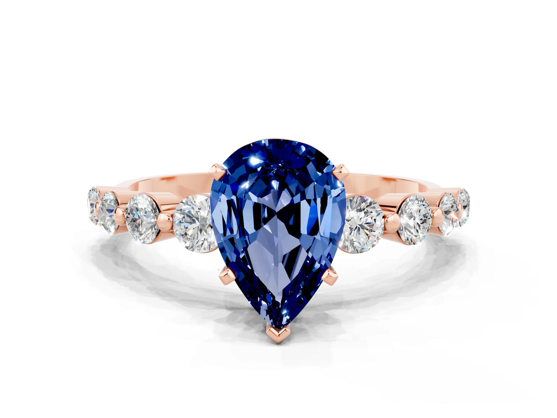 Rose gold Pear Cut Solitaire Blue Sapphire Ring with Pave Band and Four-Prong Setting
