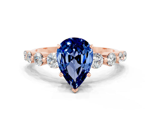 Rose gold Pear Cut Solitaire Blue Sapphire Ring with Pave Band and Four-Prong Setting