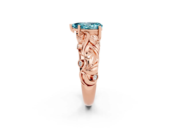 Rose gold Pear Cut Solitaire Blue Topaz Leaf-Inspired Vine Band Ring with Prong Setting