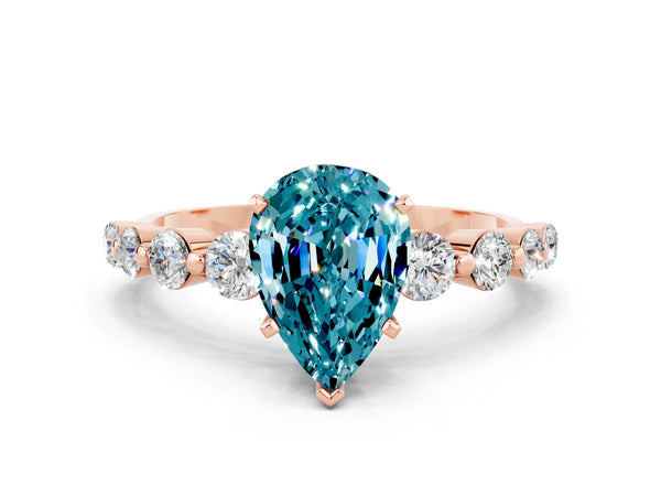 Rose gold Pear Cut Solitaire Blue Topaz Ring with Pave Band and Four-Prong Setting