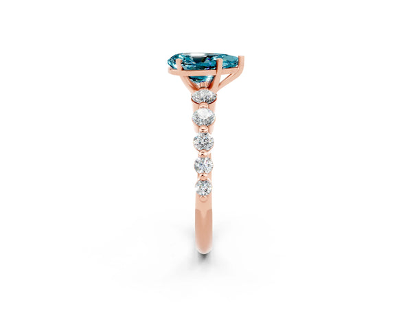 Rose gold Pear Cut Solitaire Blue Topaz Ring with Pave Band and Four-Prong Setting