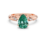 Rose gold Pear Cut Solitaire Diamond Engagement Ring with Twisted Pave Band and Four-Prong Setting