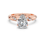 Rose gold Pear Cut Solitaire Diamond Engagement Ring with Twisted Pave Band and Four-Prong Setting