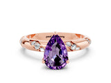 Rose gold Pear Cut Solitaire Diamond Engagement Ring with Twisted Pave Band and Four-Prong Setting