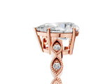 Rose gold Pear Cut Solitaire Diamond Ring with Infinity Twist Band and Four-Prong Setting_18
