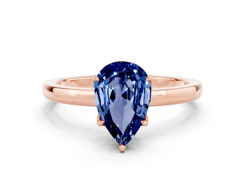 Rose gold Pear Cut Solitaire Diamond Ring with Thin Band and Four-Prong Setting