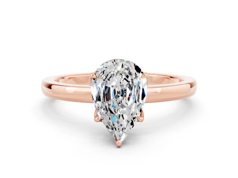 Rose gold Pear Cut Solitaire Diamond Ring with Thin Band and Four-Prong Setting