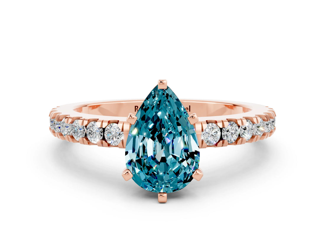 Rose gold Pear Cut Solitaire Diamond with Pavé Band and Four-Prong Setting