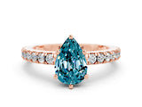 Rose gold Pear Cut Solitaire Diamond with Pavé Band and Four-Prong Setting