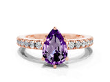 Rose gold Pear Cut Solitaire Diamond with Pavé Band and Four-Prong Setting_10