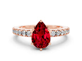Rose gold Pear Cut Solitaire Diamond with Pavé Band and Four-Prong Setting