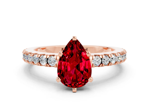 Rose gold Pear Cut Solitaire Ruby with Pavé Band and Four-Prong Setting