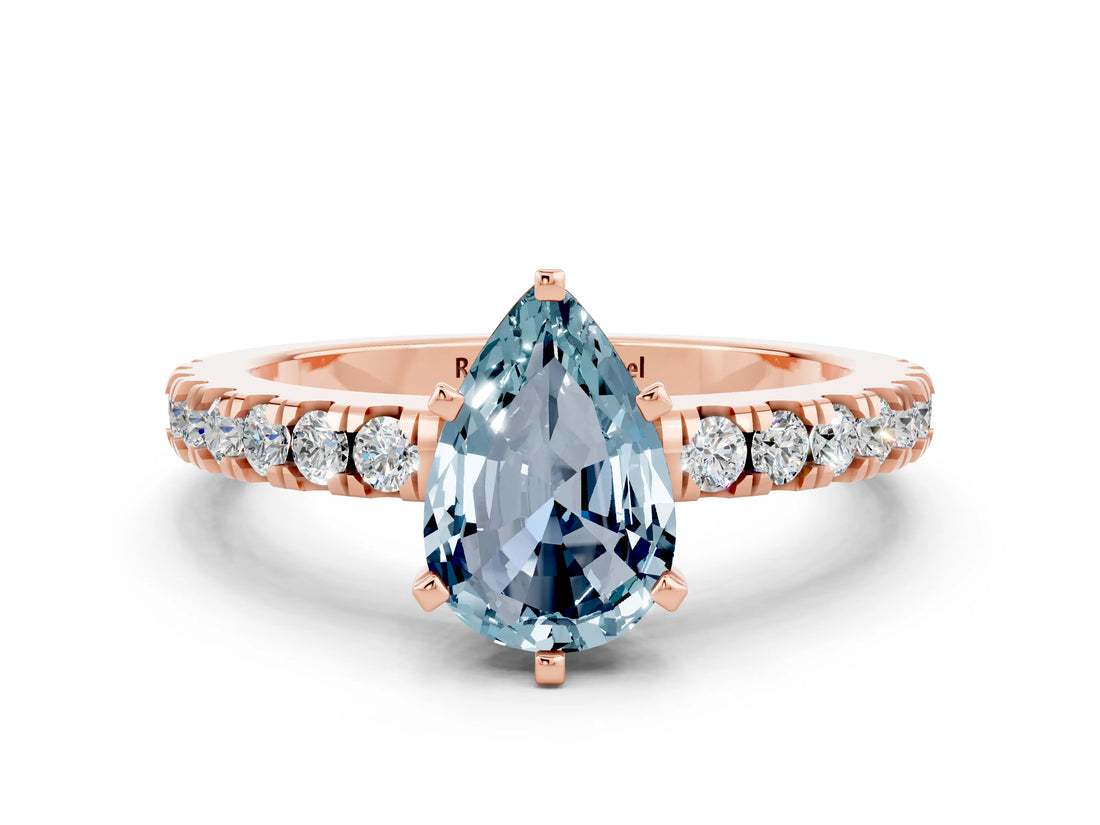 Rose gold Pear Cut Solitaire Diamond with Pavé Band and Four-Prong Setting