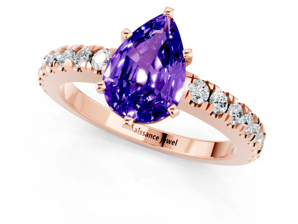 Rose gold Pear Cut Solitaire Tanzanite with Pavé Band and Four-Prong Setting