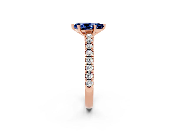 Rose gold Pear Cut Solitaire Blue Sapphire with Pavé Band and Four-Prong Setting